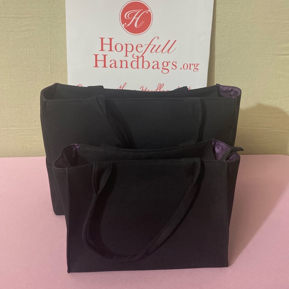 New Black travel canvas totes with beautiful lining. Two!! Well made.